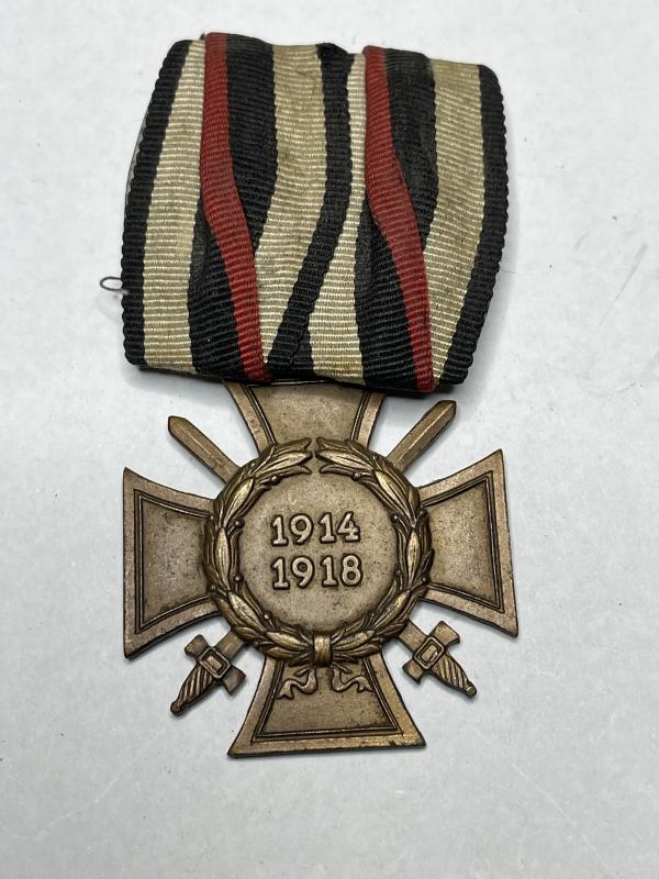 Honour cross for front fighters with swords 1914-1918 with single position ribbon bar.